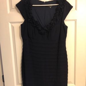 Navy cap-sleeve dress with ruffle neckline